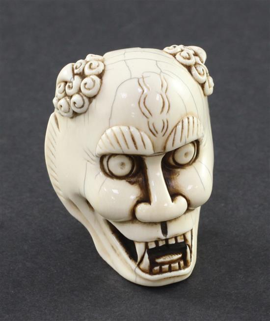 A Japanese ivory oni noh mask, early 20th century, 5.3cm